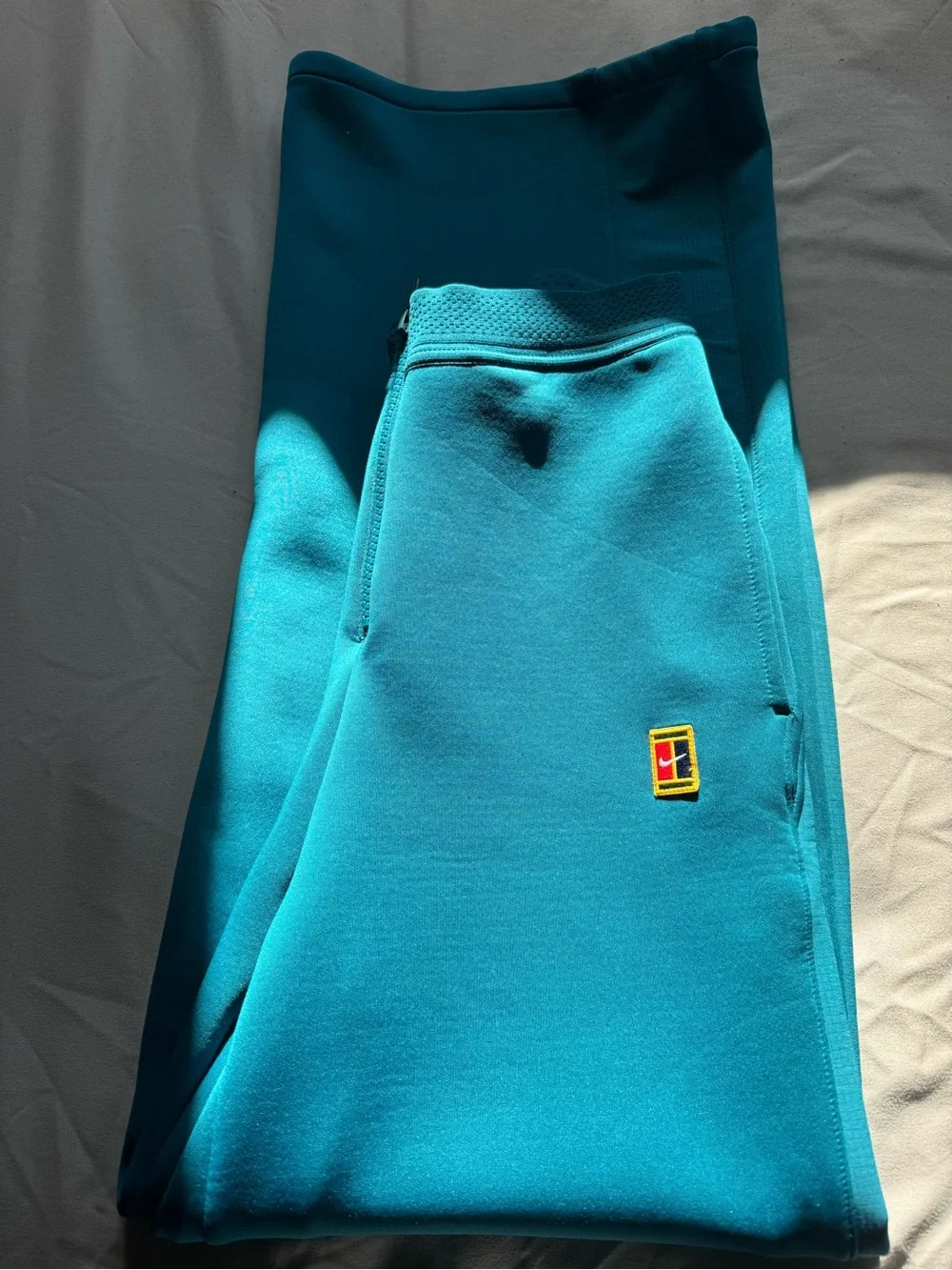 Nike court Dri-fit Women's Teal-Blue Wide-Leg Track Pants